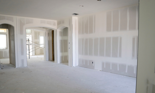 Drywall being installed